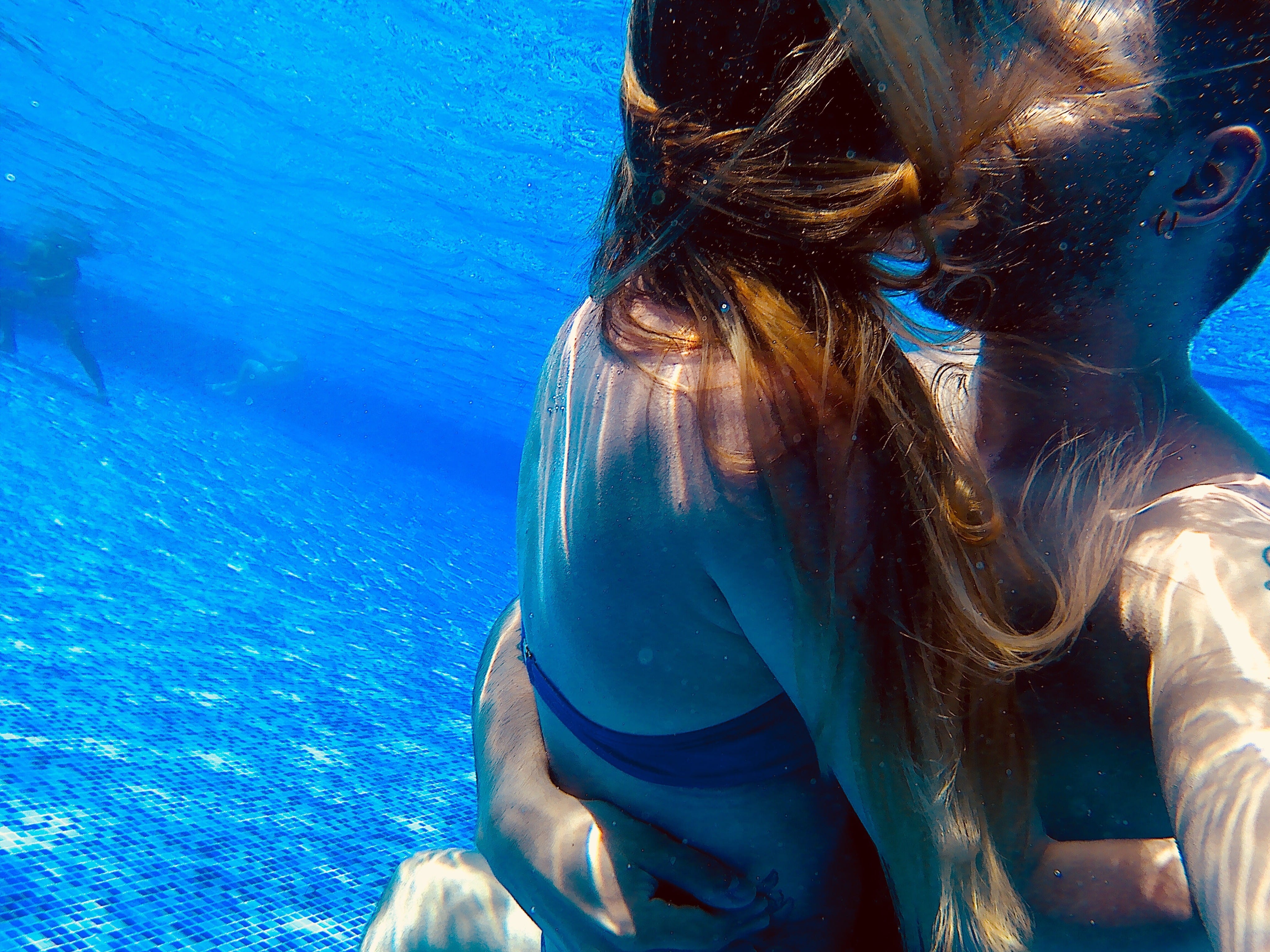 close-up-of-couple-kissing-in-swimming-p