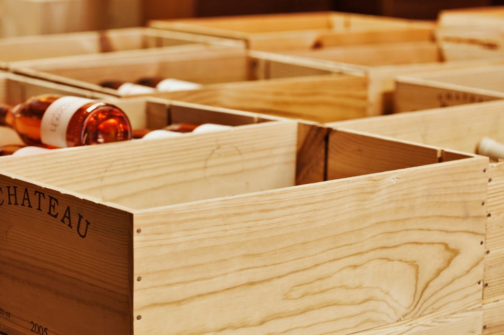 close up of crates of wine bottles