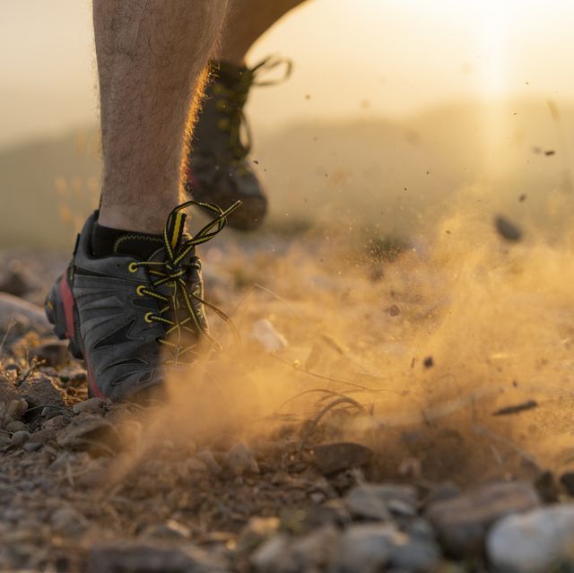 close up of feet of a trail runner
