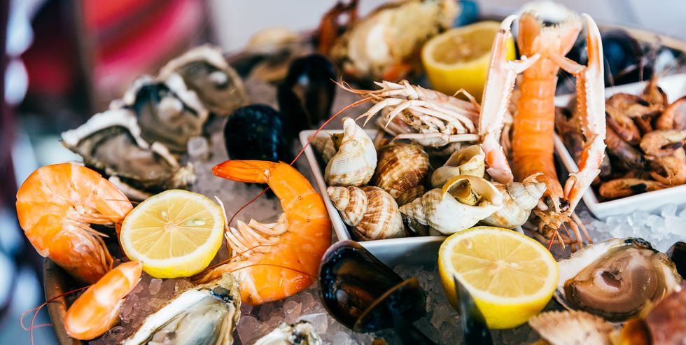 close up of fresh seafood on ice plate