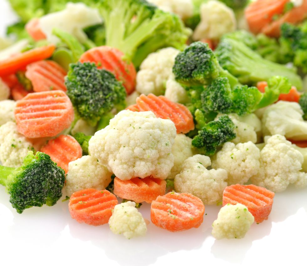 Close-up of frozen carrots, broccoli, and cauliflower