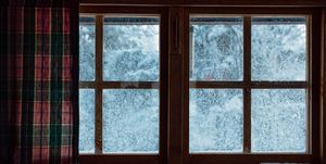 Close-Up Of Frozen Window At Home