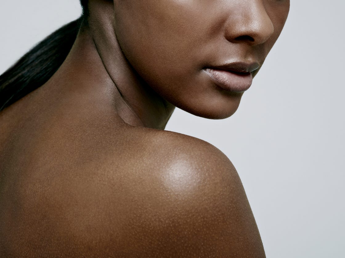 close up of girls chin and nude shoulder
