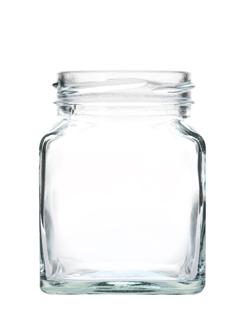 close up of glass jar against white background