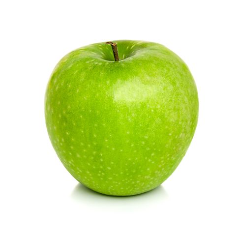 close up of green apple against white background