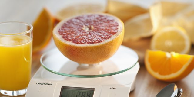 https://hips.hearstapps.com/hmg-prod/images/close-up-of-half-of-orange-on-kitchen-scale-royalty-free-image-1590005123.jpg?crop=1.00xw:0.752xh;0,0.135xh&resize=640:*