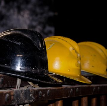 Close-Up Of Hardhats On Table