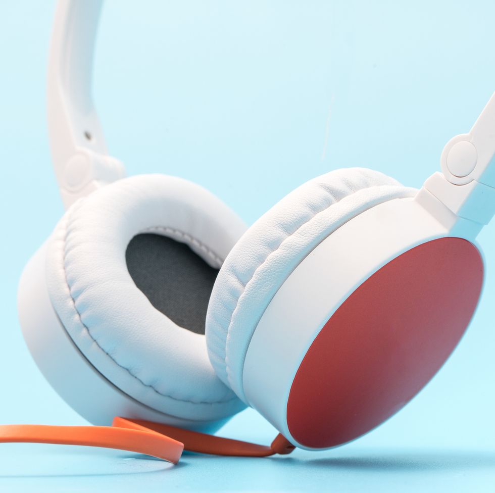 Close-Up Of Headphones Against Blue Background