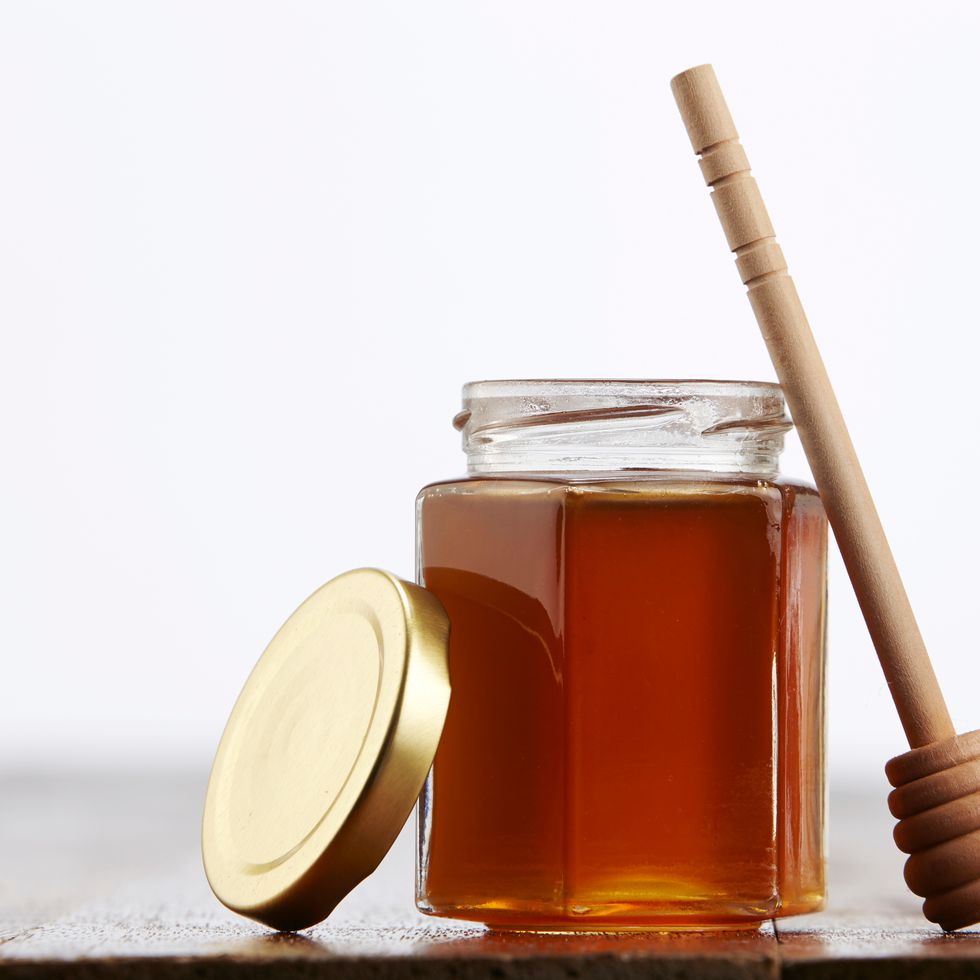 close up of honey jar
