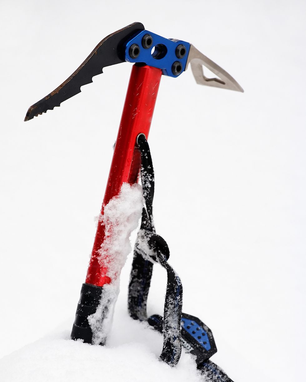 Close-Up Of Ice Axe On Snow