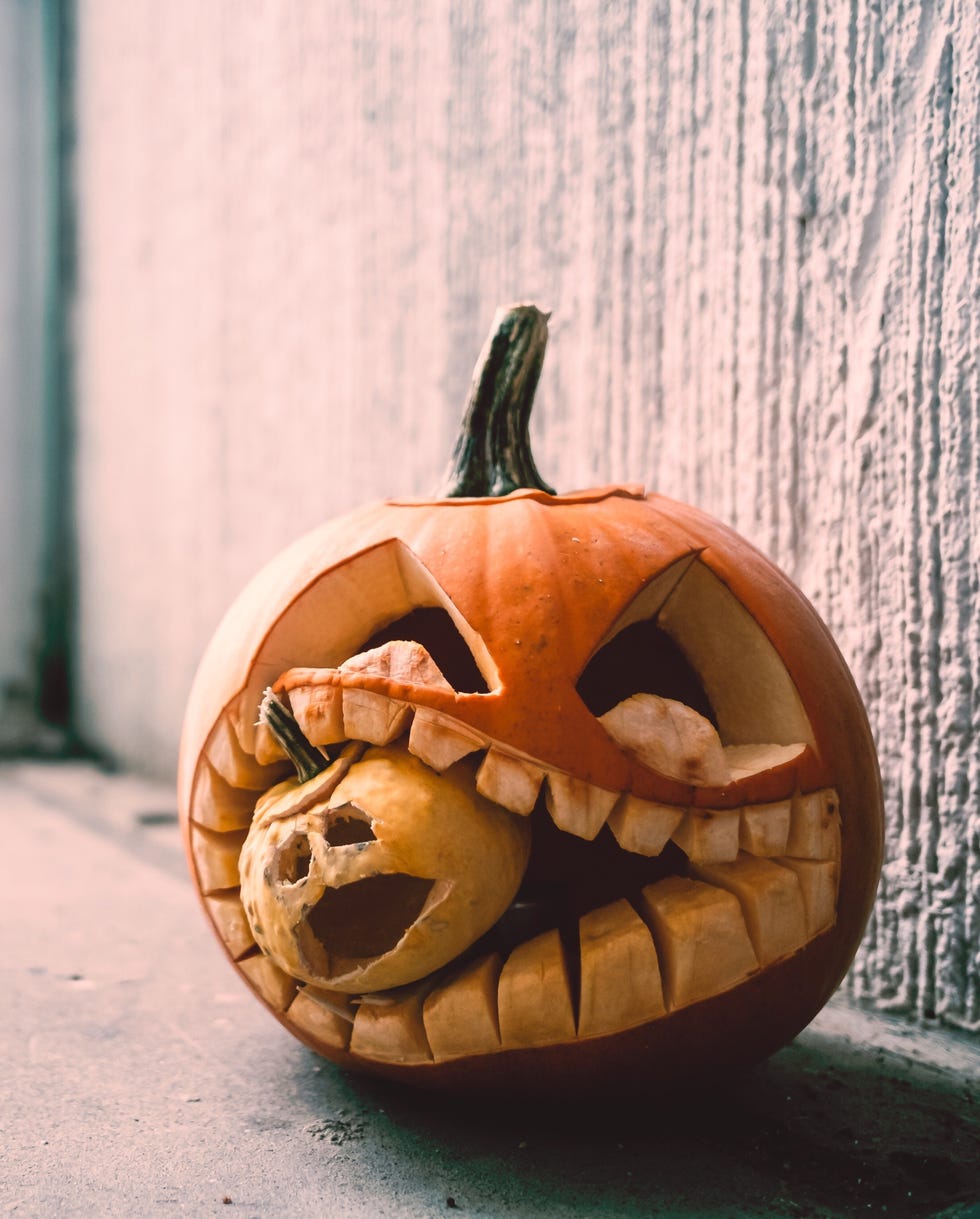 Close-Up Of Jack O Lantern On Window Sill During Halloween