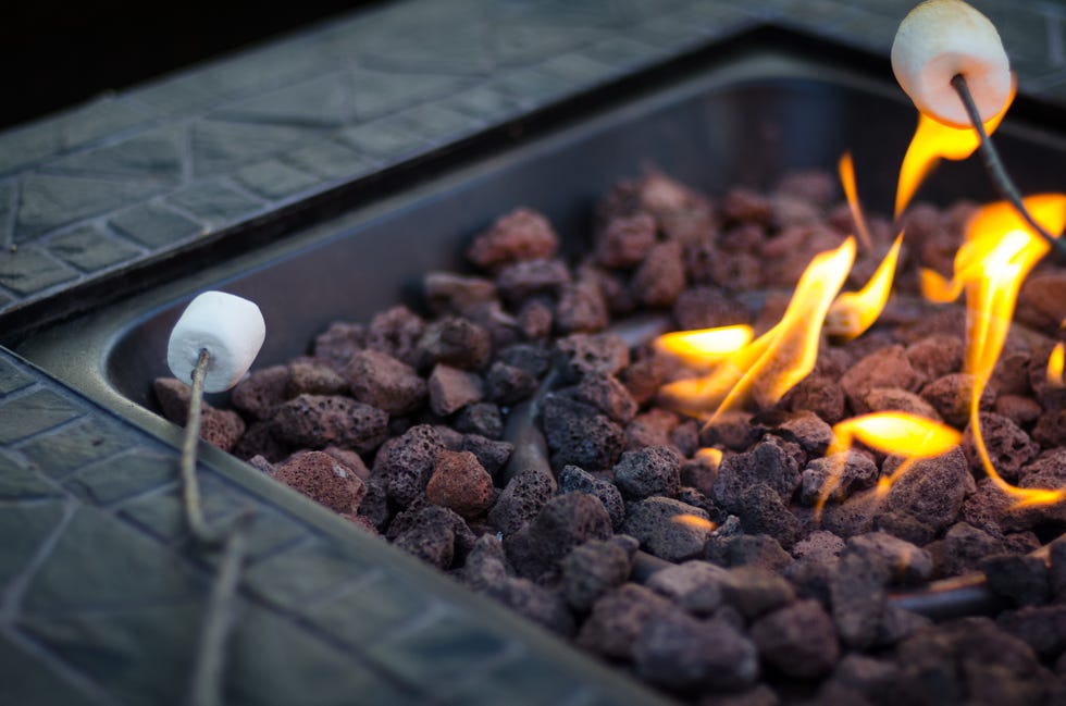 close up of marshmallows by fire pit