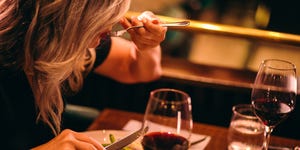 Close-up of mature woman healthy dinner at luxurious restaurant