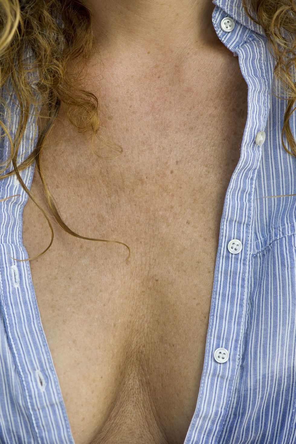 close up of mature woman's chest and cleavage