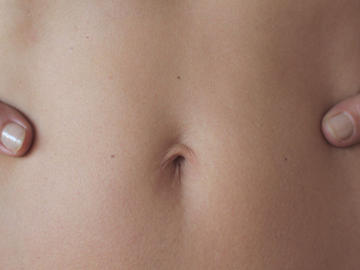 Infected Belly Button Piercing: Cleaning Tips & More