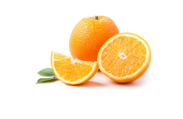 Close-Up Of Orange Slices On White Background