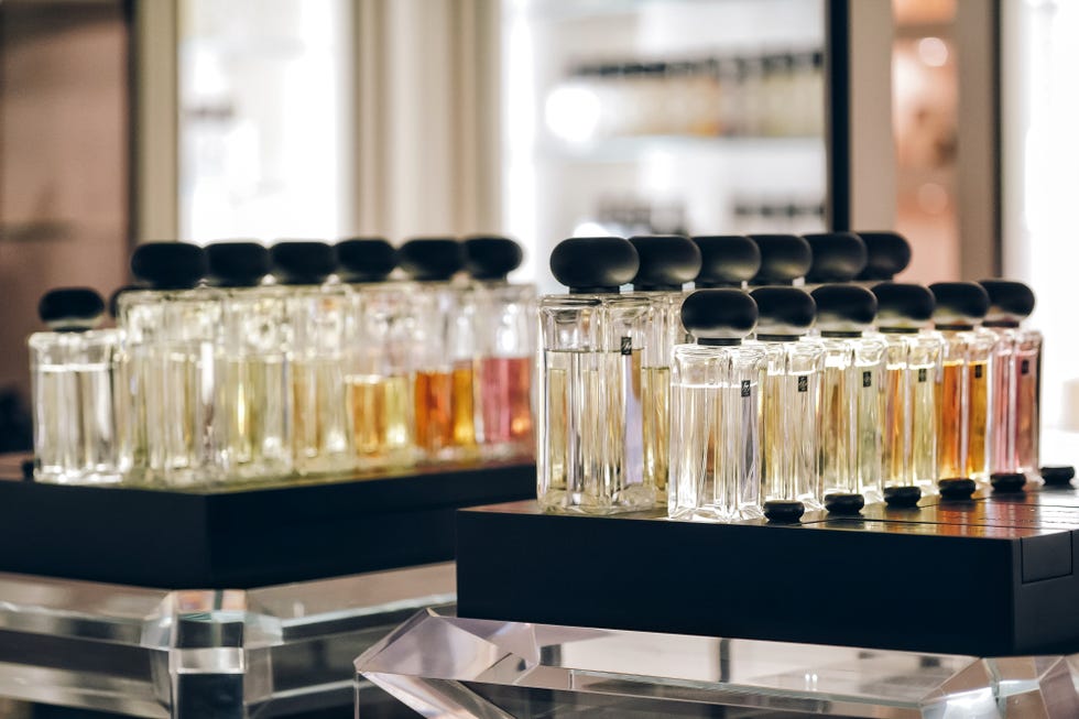 close up of parfum bottles on table