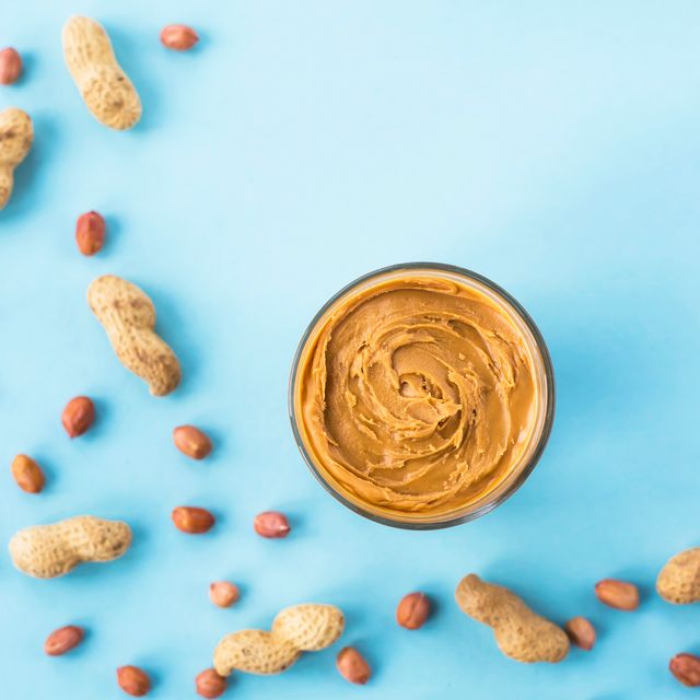 Close-Up Of Peanut Butter In Glass On Table