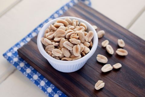 foods with zinc close up of peanuts in bowl on cutting board