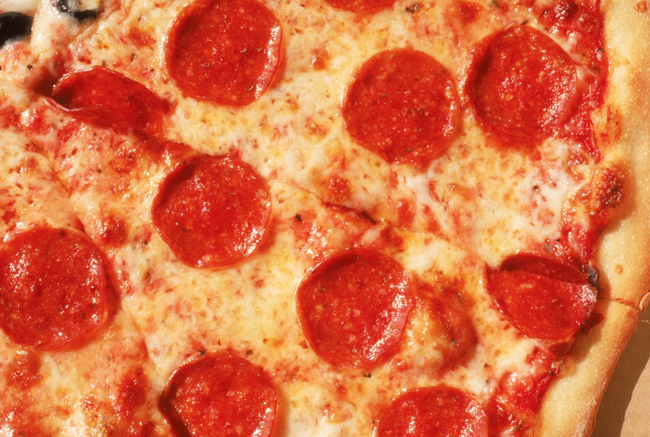 https://hips.hearstapps.com/hmg-prod/images/close-up-of-pepperoni-pizza-royalty-free-image-1634671596.jpg