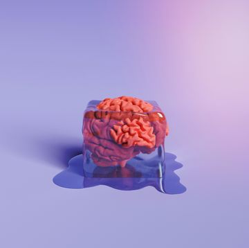 brain trapped in melting ice cube on purple background