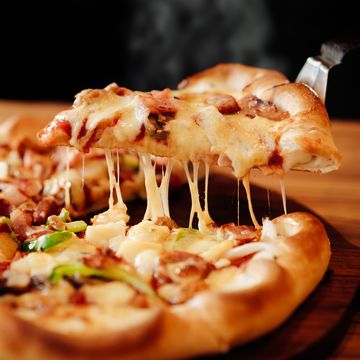 Close-Up Of Pizza On Table