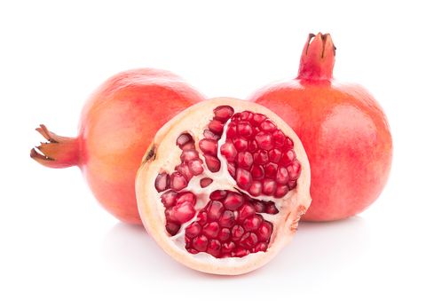 Close-Up Of Pomegranate On White Background