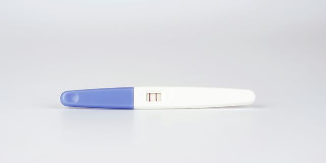 Close-Up Of Pregnancy Test Over White Background