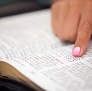 bible verses about thankfulness  close up of the bible with a woman's pointer finger with pink nail polish pointing at a verse