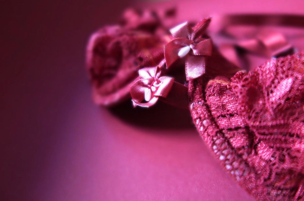 close up of ribbon on pink bra