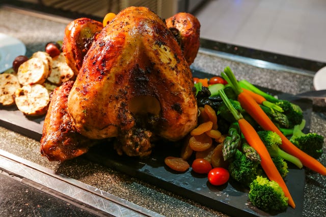 Close-Up Of Roasted Chicken On Slate