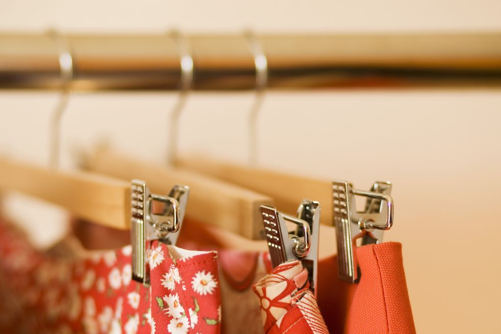 close up of skirts hanging on clothes rack