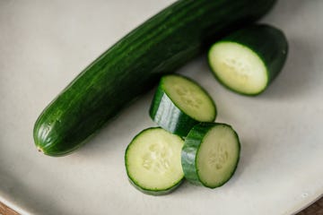 close up of slices of cucumber on a plate