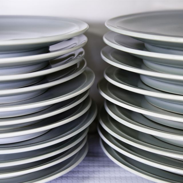 Close-Up Of Stacked Empty Plates