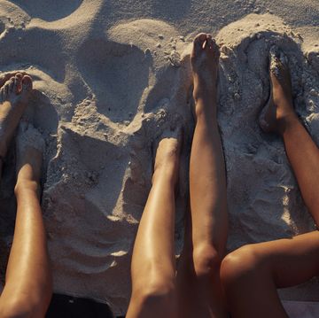 benen zonnen strand