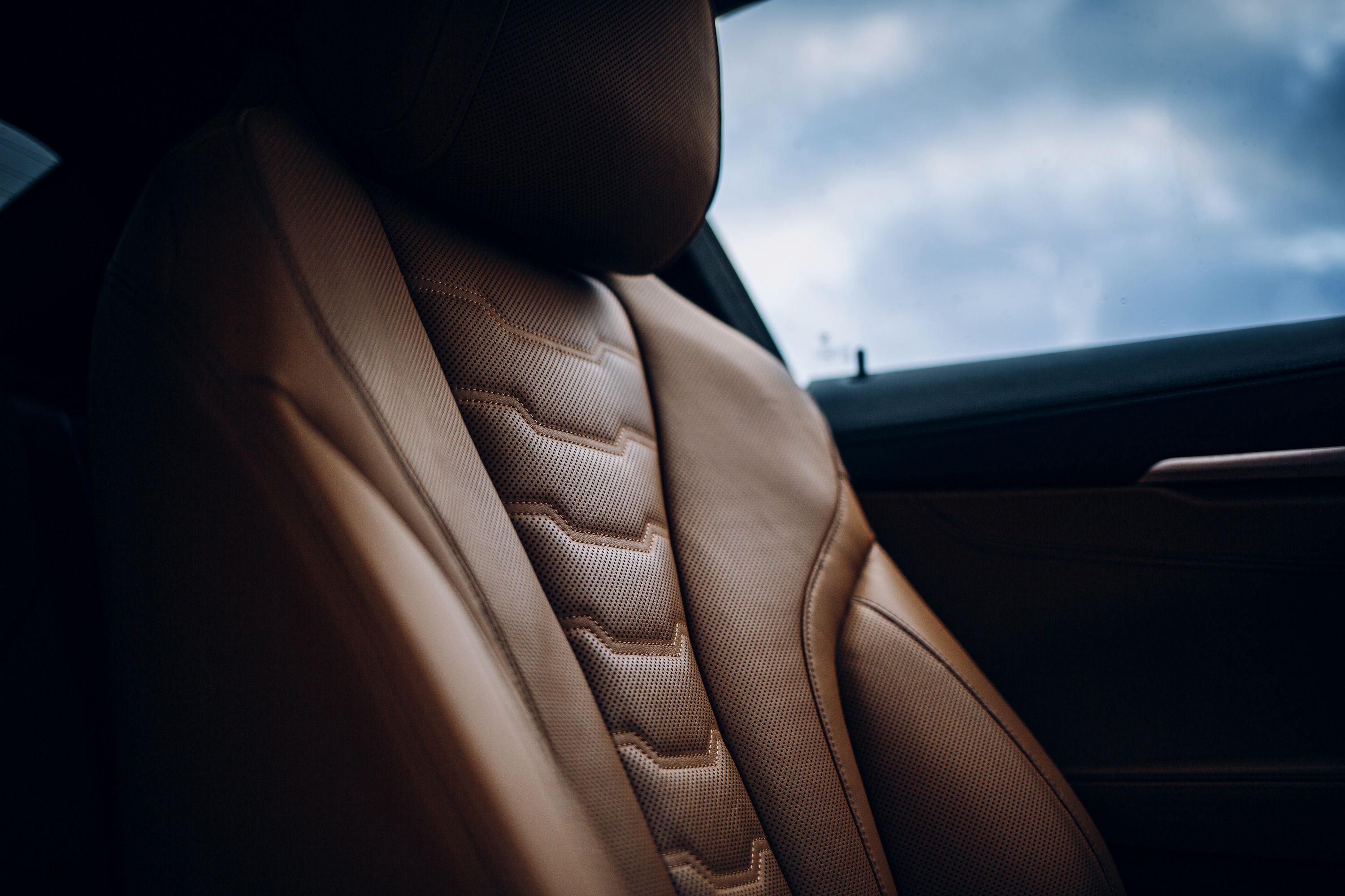 https://hips.hearstapps.com/hmg-prod/images/close-up-of-vehicle-seat-in-car-royalty-free-image-1639850703.jpg