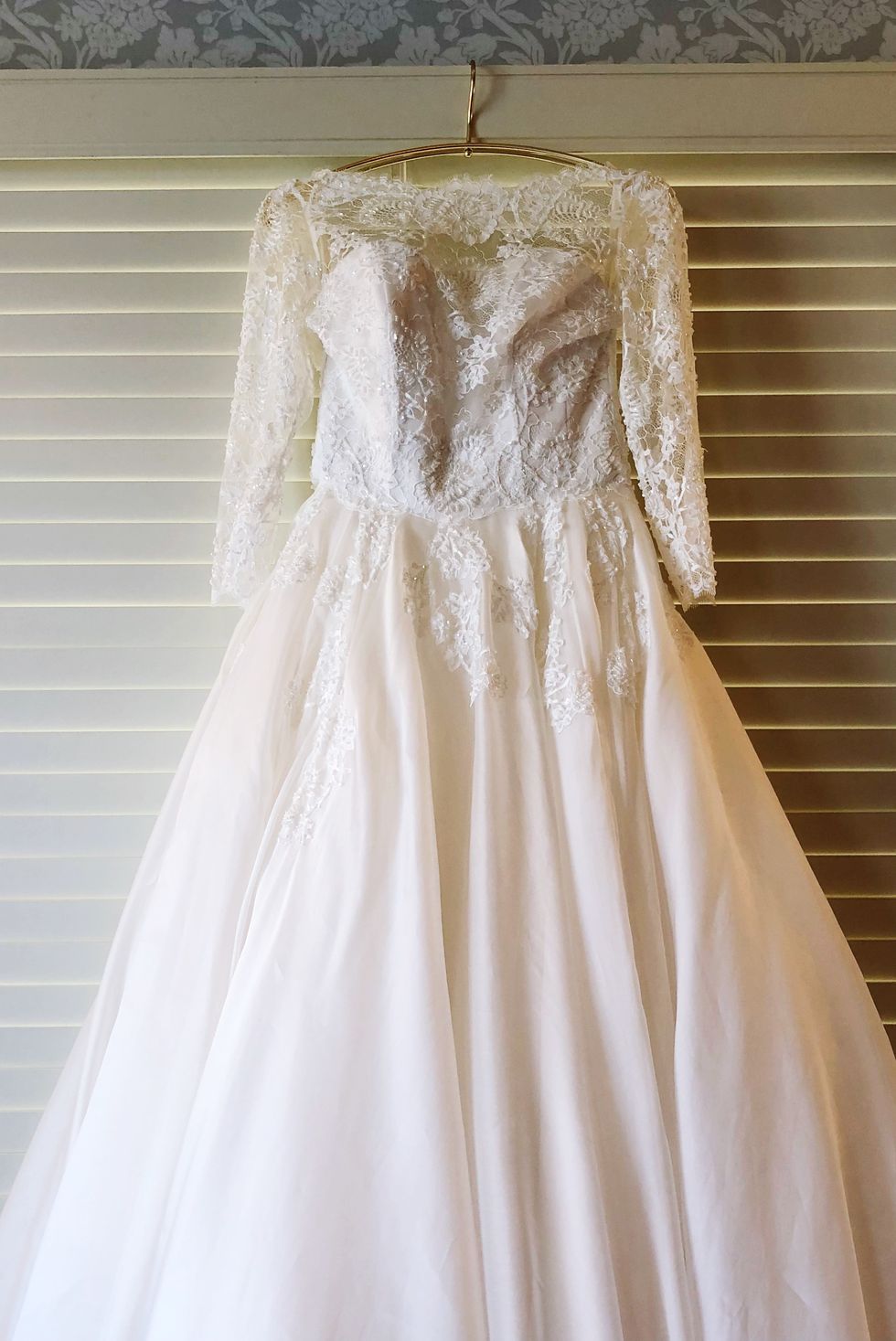 Close-Up Of Wedding Dress On Wall