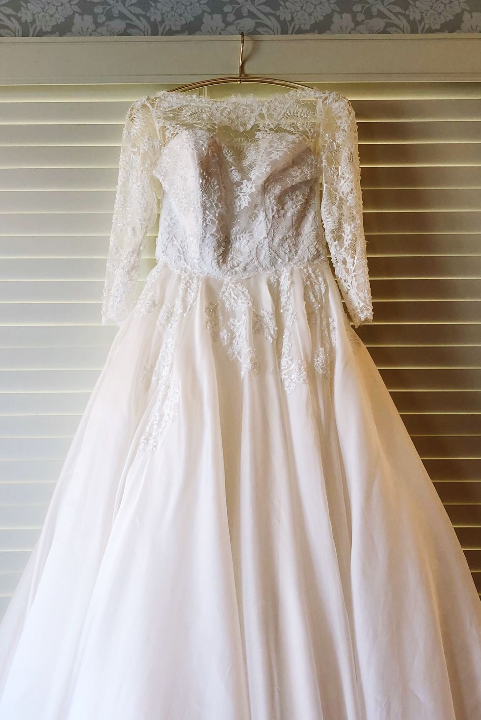 Close-Up Of Wedding Dress On Wall