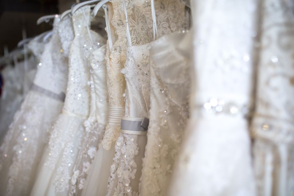 Close-Up Of Wedding Dresses In Bridal Shop