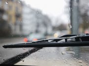 close up of wet windshield during rainy season