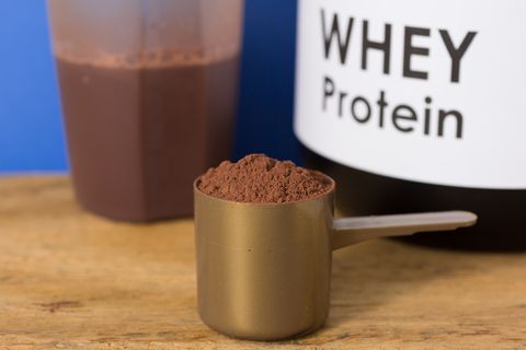 Close-Up Of Whey Protein In Spoon On Table