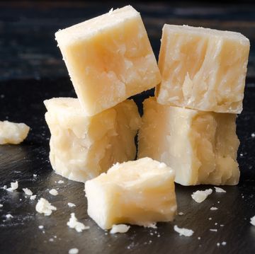 Close-Up Of White Cheddar Cheese On Table