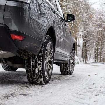 closeup of winter car tires mounted on a sport utility vehicle