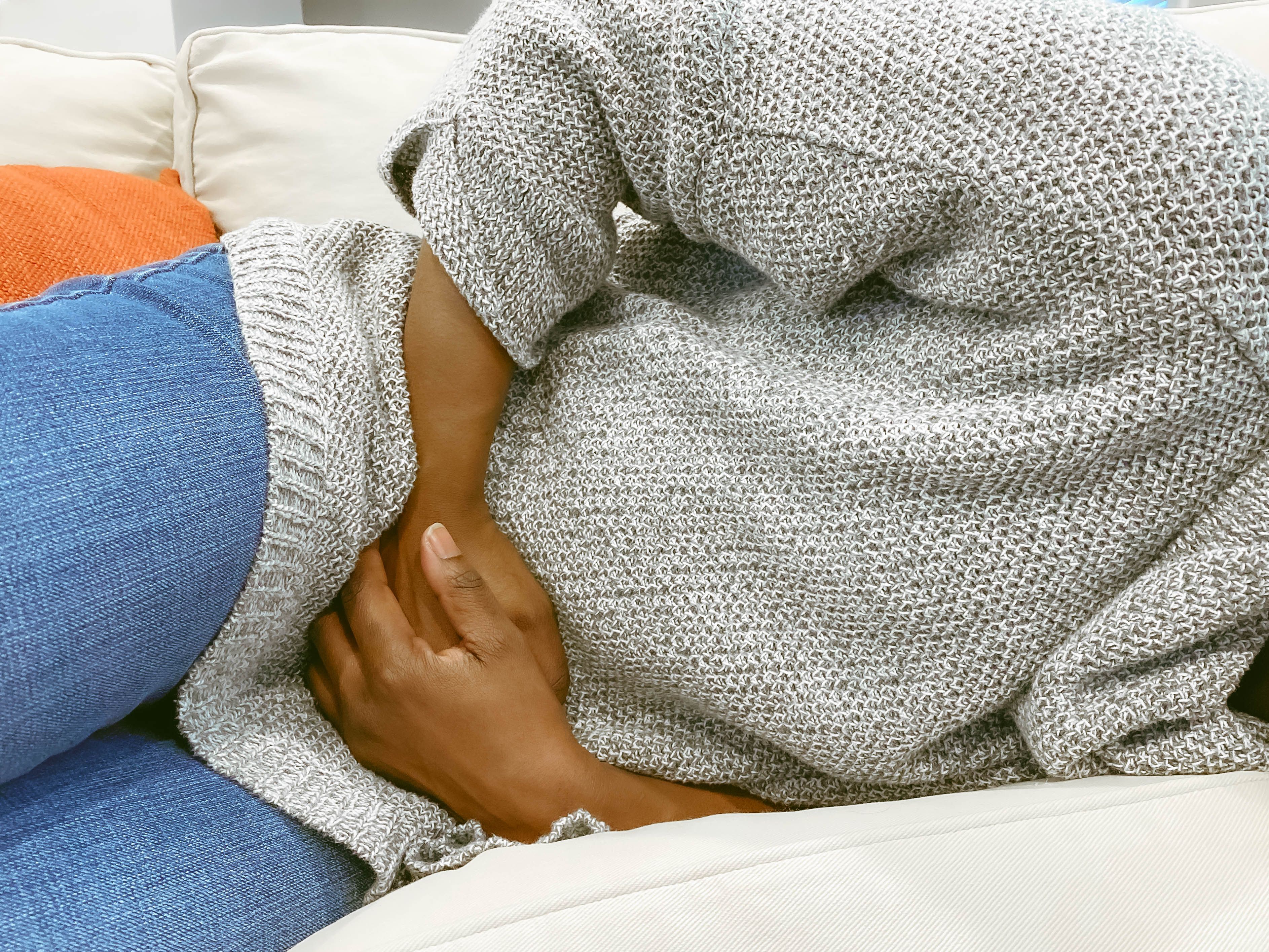 Do Cramps But No Period Mean Pregnancy? Experts Explain