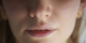 close up of womans mouth and nose