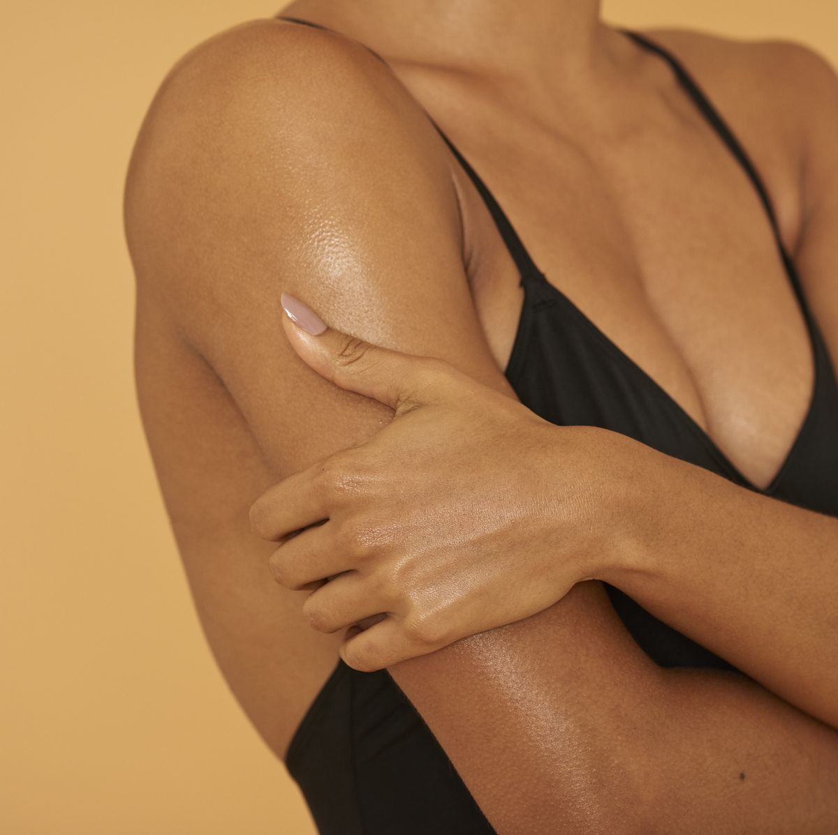 close up of woman's tanned body