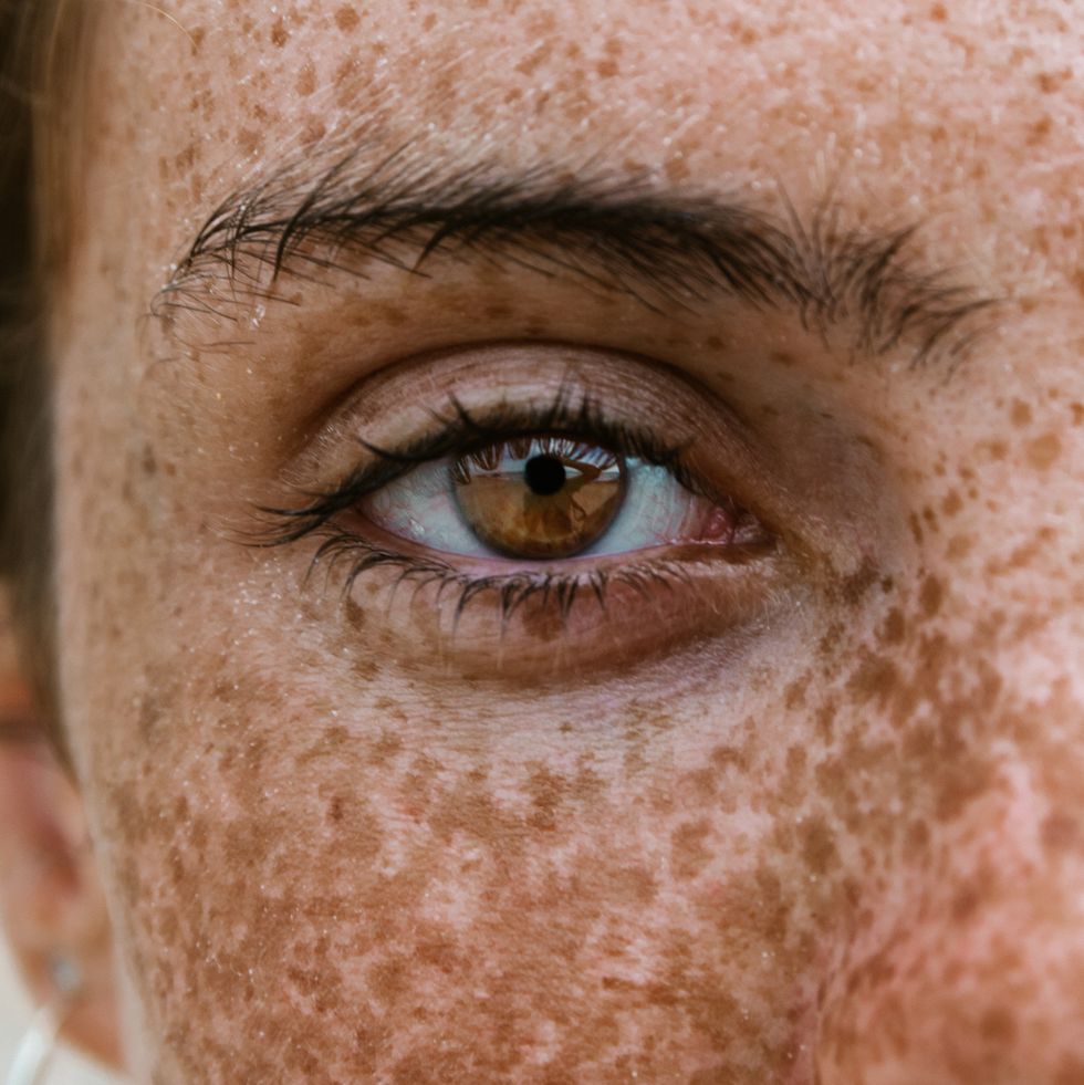 close up portrait of woman with freckles