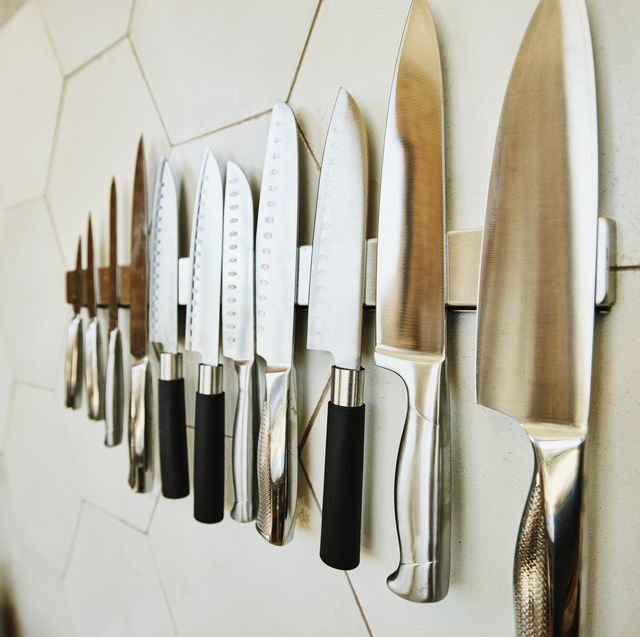 https://hips.hearstapps.com/hmg-prod/images/close-up-shot-of-kitchen-knives-on-wall-in-kitchen-royalty-free-image-1689888875.jpg?crop=0.670xw:1.00xh;0.173xw,0&resize=640:*