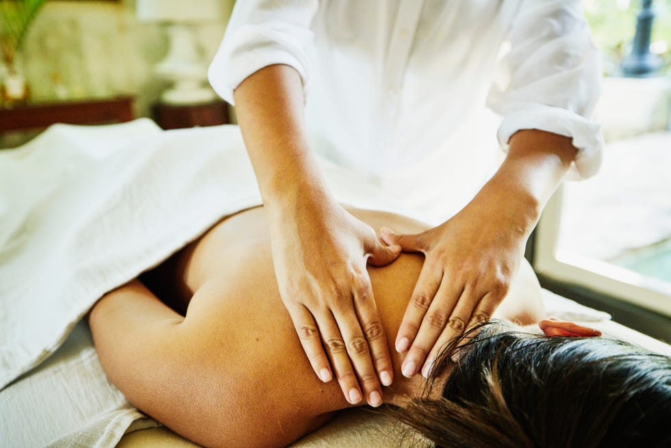 close up shot of woman receiving massage at luxury spa