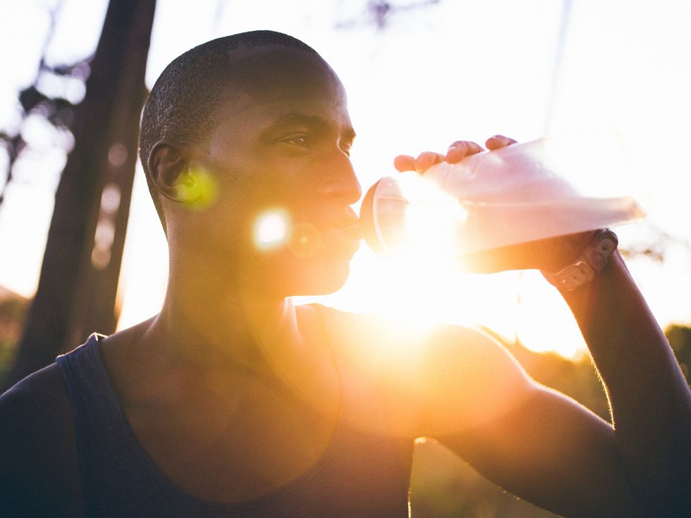 close up shot with lens flare of afro american athlete